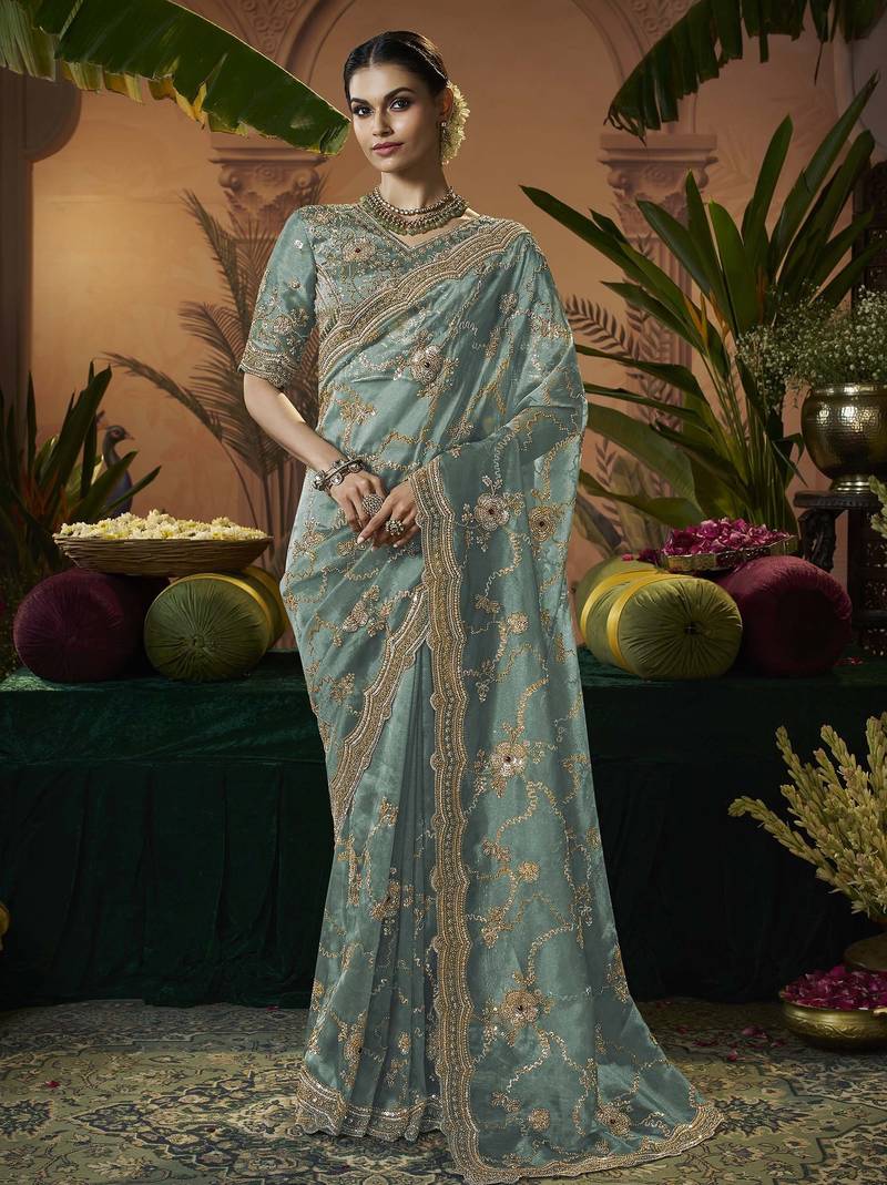 Designer sea green tissue fabric saree with green tissue blouse fabric