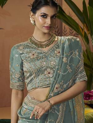 Designer sea green tissue fabric saree with green tissue blouse fabric 2