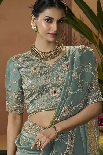 Designer sea green tissue fabric saree with green tissue blouse fabric