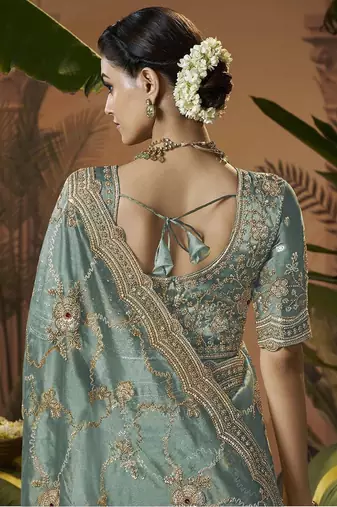 Designer sea green tissue fabric saree with green tissue blouse fabric