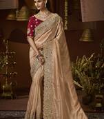 designer biscuit jacquard fabric saree with maroon silk blend blouse fabric