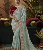 designer sky soft jacquard fabric saree with maroon silk blend blouse fabric