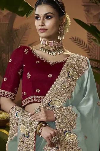 designer sky soft jacquard fabric saree with maroon silk blend blouse fabric