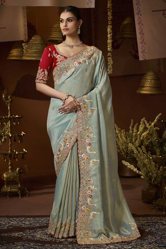 designer sea green soft jacquard fabric saree with maroon silk blend blouse fabric