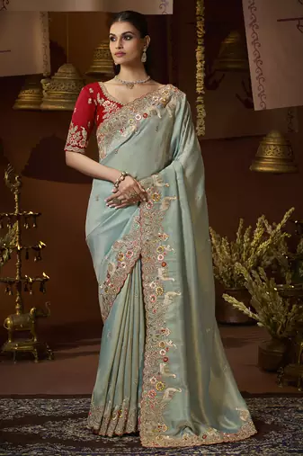 designer sea green soft jacquard fabric saree with maroon silk blend blouse fabric