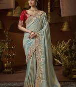 designer sea green soft jacquard fabric saree with maroon silk blend blouse fabric
