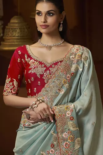 designer sea green soft jacquard fabric saree with maroon silk blend blouse fabric