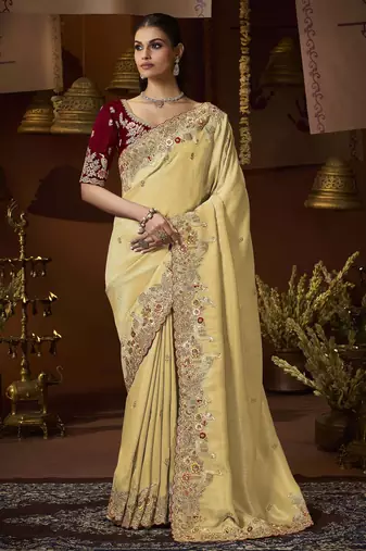 designer yellow soft jacquard fabric saree with maroon silk blend blouse fabric