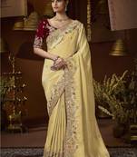 designer yellow soft jacquard fabric saree with maroon silk blend blouse fabric