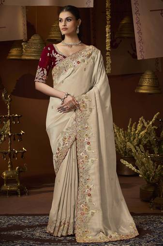 designer gold soft jacquard fabric saree with maroon silk blend blouse fabric