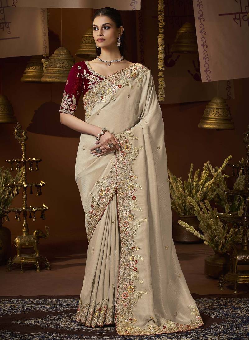 designer gold soft jacquard fabric saree with maroon silk blend blouse fabric