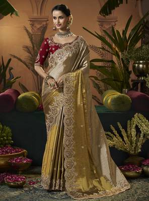 designer gold viscose fabric saree with maroon silk blend blouse fabric 1