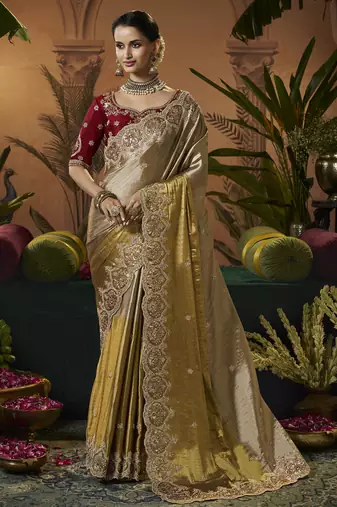 designer gold viscose fabric saree with maroon silk blend blouse fabric