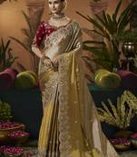 designer gold viscose fabric saree with maroon silk blend blouse fabric