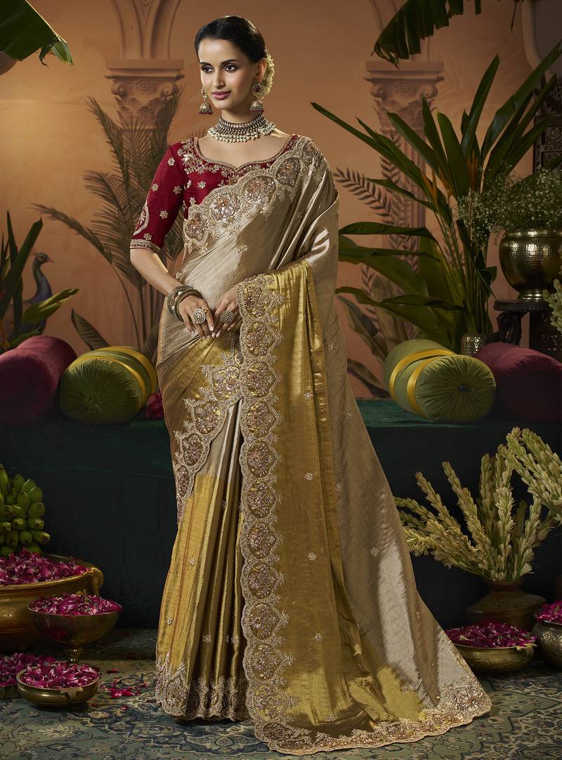 designer gold viscose fabric saree with maroon silk blend blouse fabric
