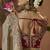 designer gold viscose fabric saree with maroon silk blend blouse fabric