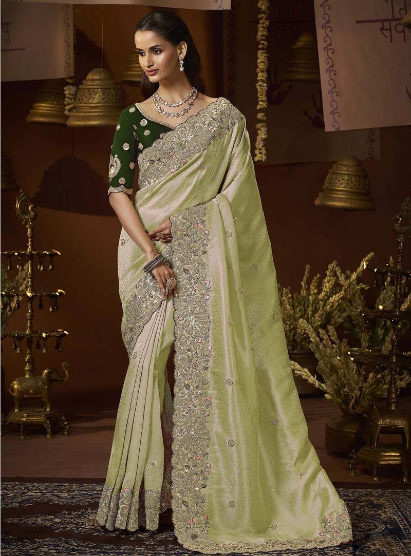 designer green jacquard fabric saree with green silk blend blouse fabric