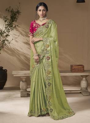 designer green viscose fabric saree with rani pink silk blend blouse fabric 1