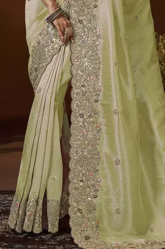 designer green jacquard fabric saree with green silk blend blouse fabric