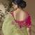 designer green viscose fabric saree with rani pink silk blend blouse fabric