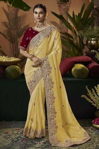 designer yellow soft jacquard fabric saree with maroon silk blend blouse fabric