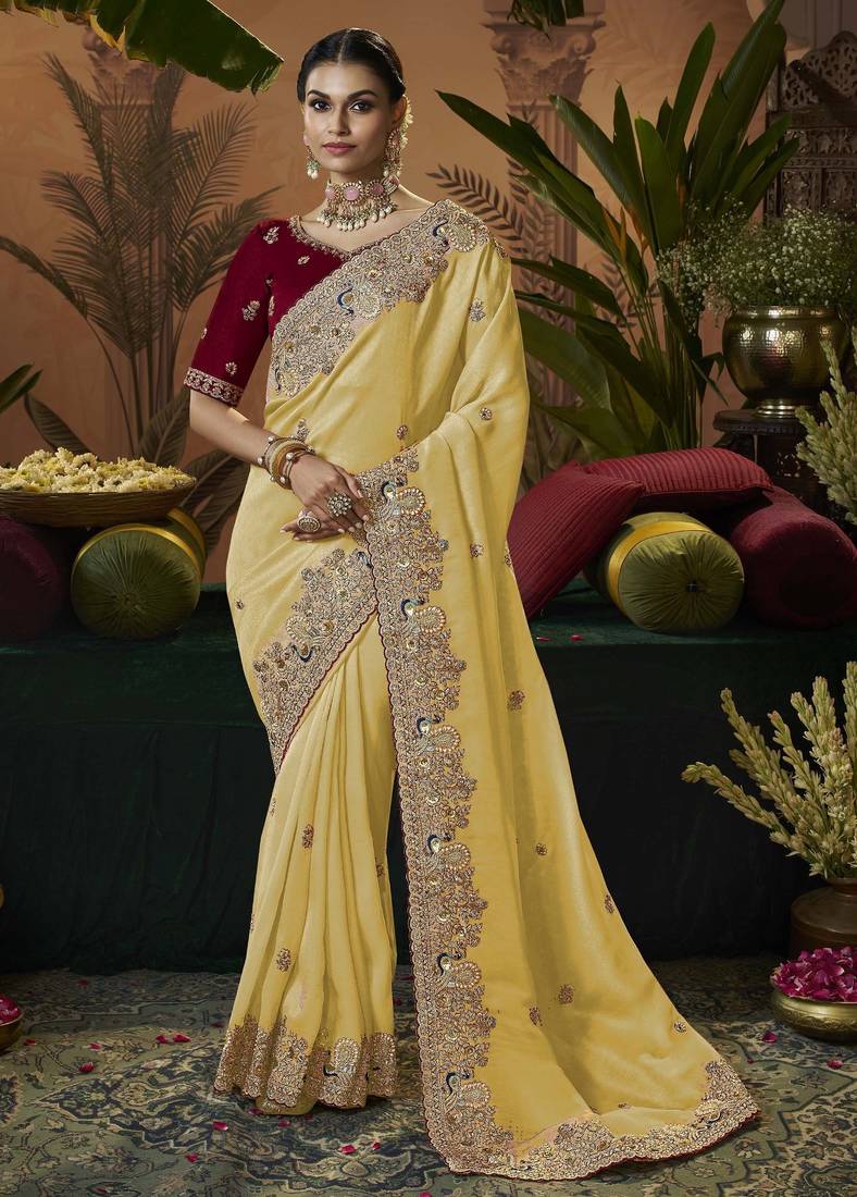 designer yellow soft jacquard fabric saree with maroon silk blend blouse fabric