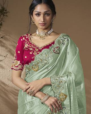 designer green viscose fabric saree with rani pink silk blend blouse fabric 2