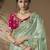 designer green viscose fabric saree with rani pink silk blend blouse fabric