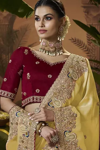 designer yellow soft jacquard fabric saree with maroon silk blend blouse fabric
