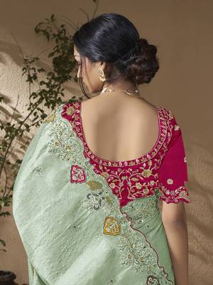 designer green viscose fabric saree with rani pink silk blend blouse fabric 3