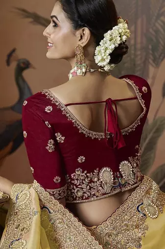 designer yellow soft jacquard fabric saree with maroon silk blend blouse fabric