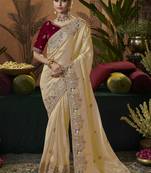 designer gold soft jacquard fabric saree with maroon silk blend blouse fabric