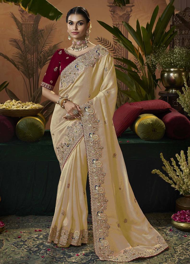 designer gold soft jacquard fabric saree with maroon silk blend blouse fabric