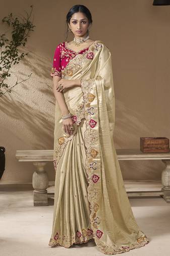 designer gold viscose fabric saree with rani pink silk blend blouse fabric