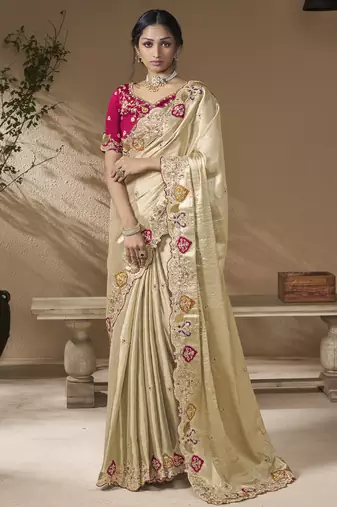 designer gold viscose fabric saree with rani pink silk blend blouse fabric