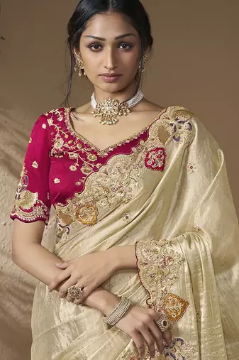 designer gold viscose fabric saree with rani pink silk blend blouse fabric