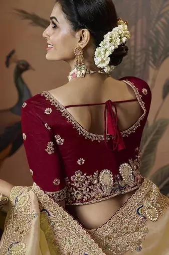 designer gold soft jacquard fabric saree with maroon silk blend blouse fabric