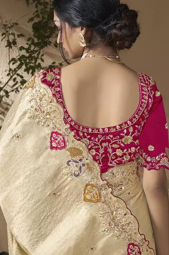 designer gold viscose fabric saree with rani pink silk blend blouse fabric