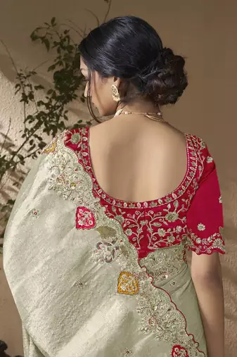 designer dusty green viscose fabric saree with rani pink silk blend blouse fabric