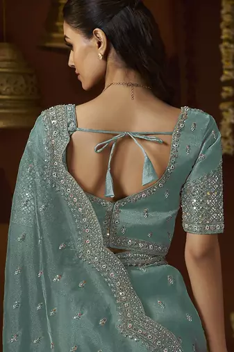 Designer green tissue fabric saree with green tissue blouse fabric