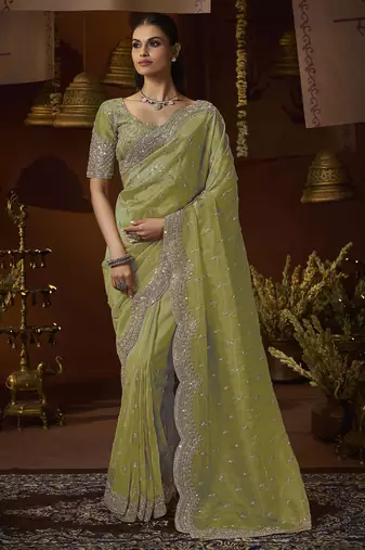 Designer green tissue fabric saree with green tissue blouse fabric