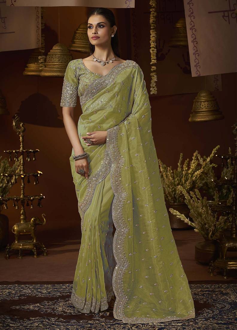 Designer green tissue fabric saree with green tissue blouse fabric
