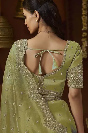 Designer green tissue fabric saree with green tissue blouse fabric