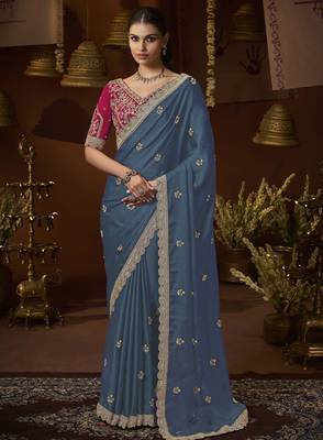 designer green satin fabric saree with rani pink silk blend blouse fabric 1