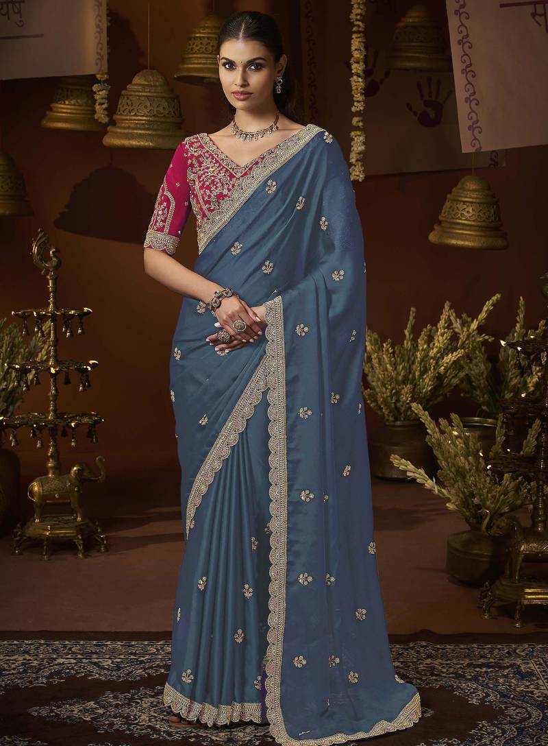 designer green satin fabric saree with rani pink silk blend blouse fabric