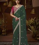 designer green satin fabric saree with rani pink silk blend blouse fabric