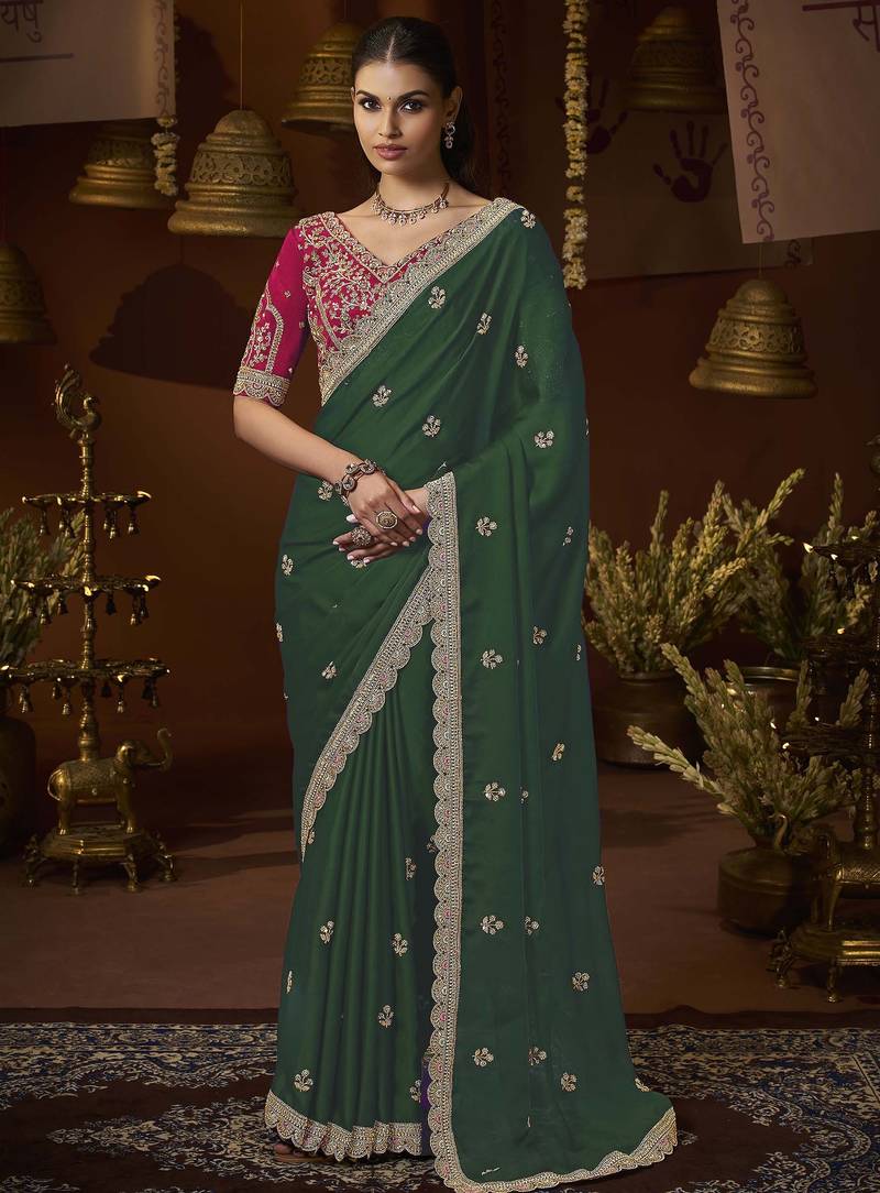 designer green satin fabric saree with rani pink silk blend blouse fabric