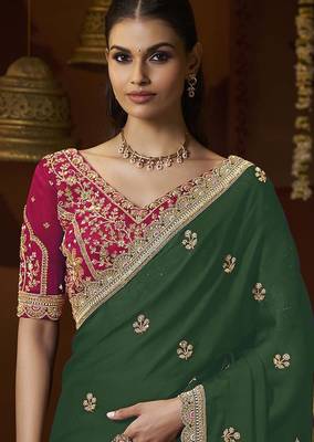 designer green satin fabric saree with rani pink silk blend blouse fabric 2