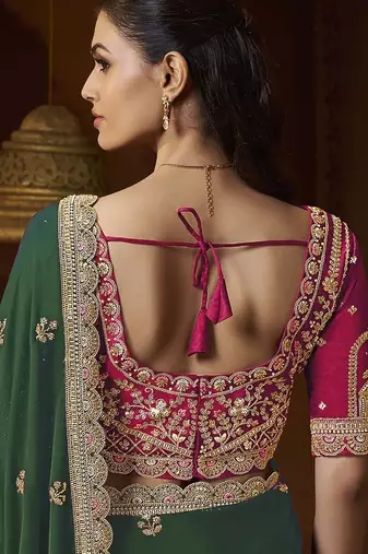 designer green satin fabric saree with rani pink silk blend blouse fabric