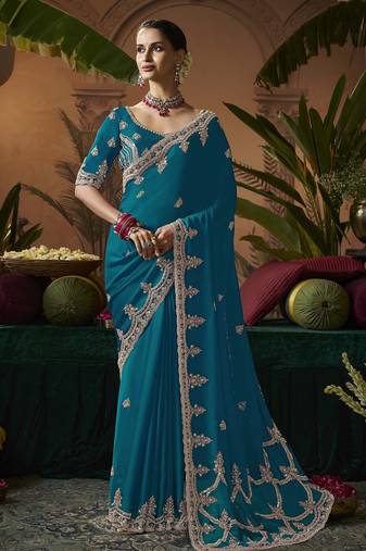 Designer green satin fabric saree with green satin blouse fabric